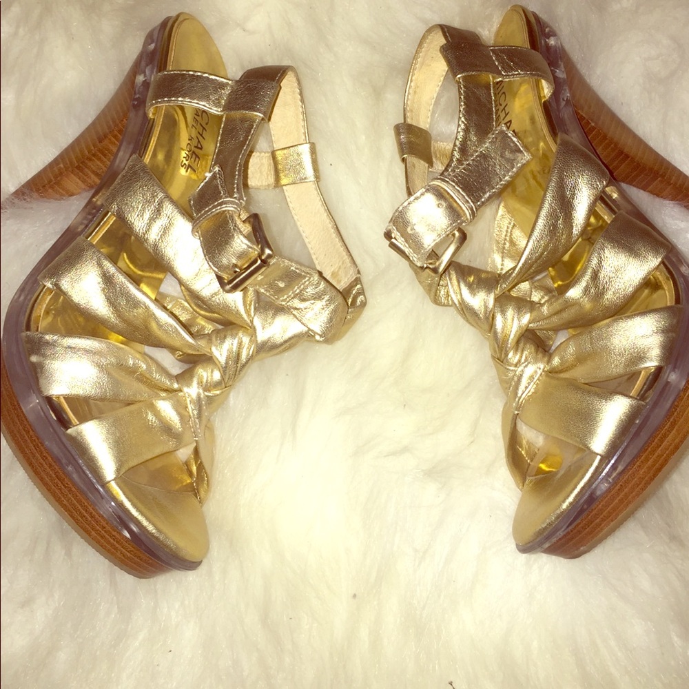 Michael Kors gold woven heel sandals.